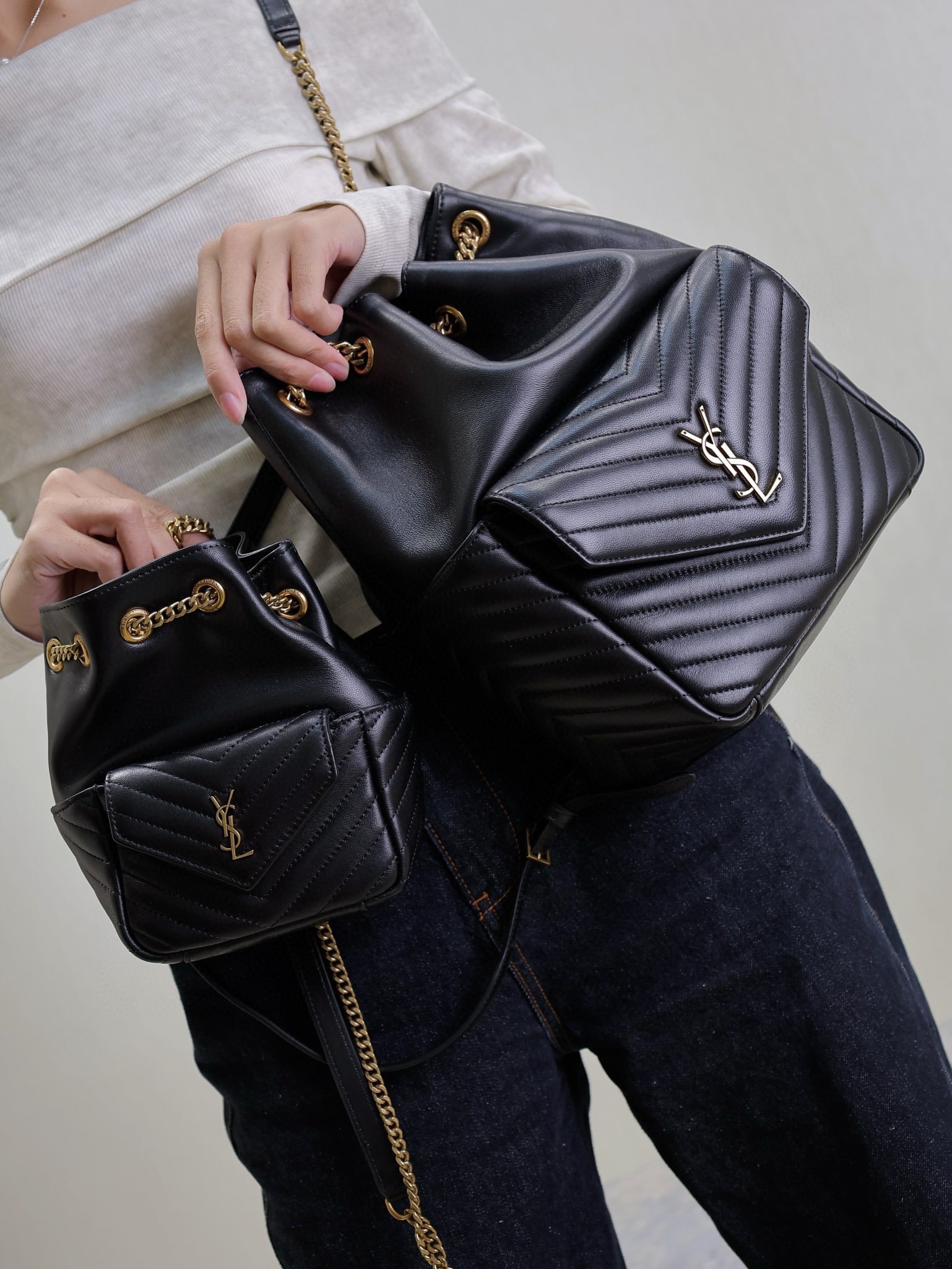 입생로랑 모노그램 램스킨 플랩 백팩